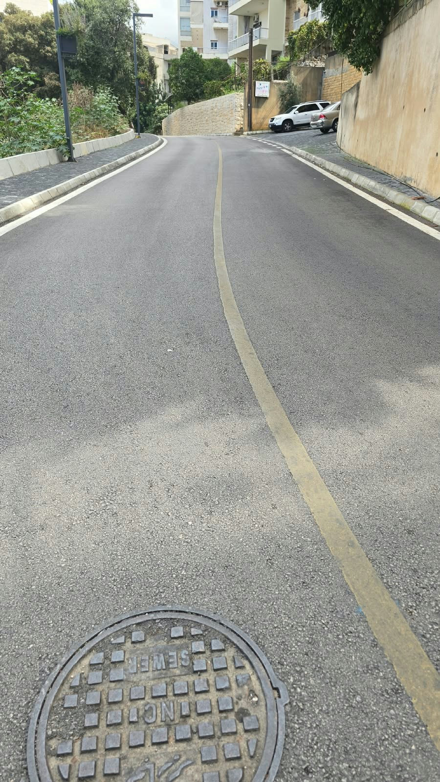 A well-asphalted road with proper lines